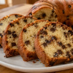 Slices of chocolate chip sour cream Bundt cake showing moist crumb and semisweet chocolate chips